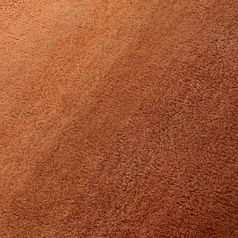 Ковер из шерсти Over Horizon терракотового цвета из коллекции Trendy Ruffles, 120x180 см