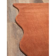 Ковер из шерсти Over Horizon терракотового цвета из коллекции Trendy Ruffles, 120x180 см